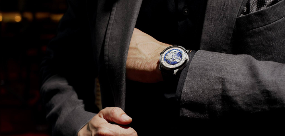 Hands of a man with a Jaeger-LeCoultre watch