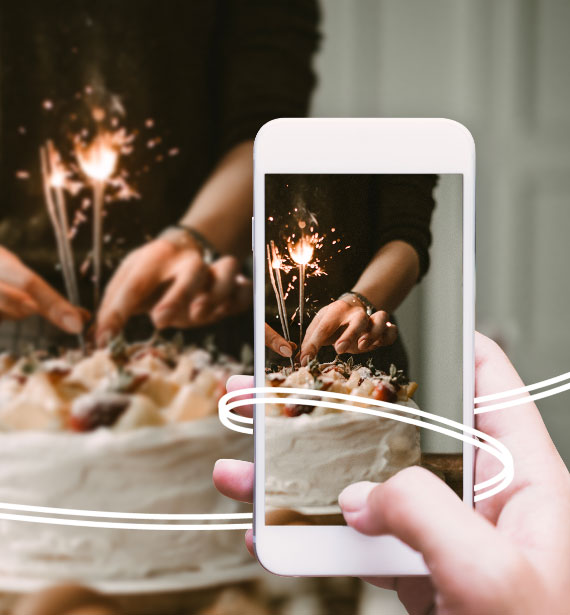 Taking picture of a birthday cake